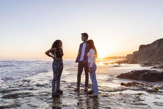 Sunset beach hike students image